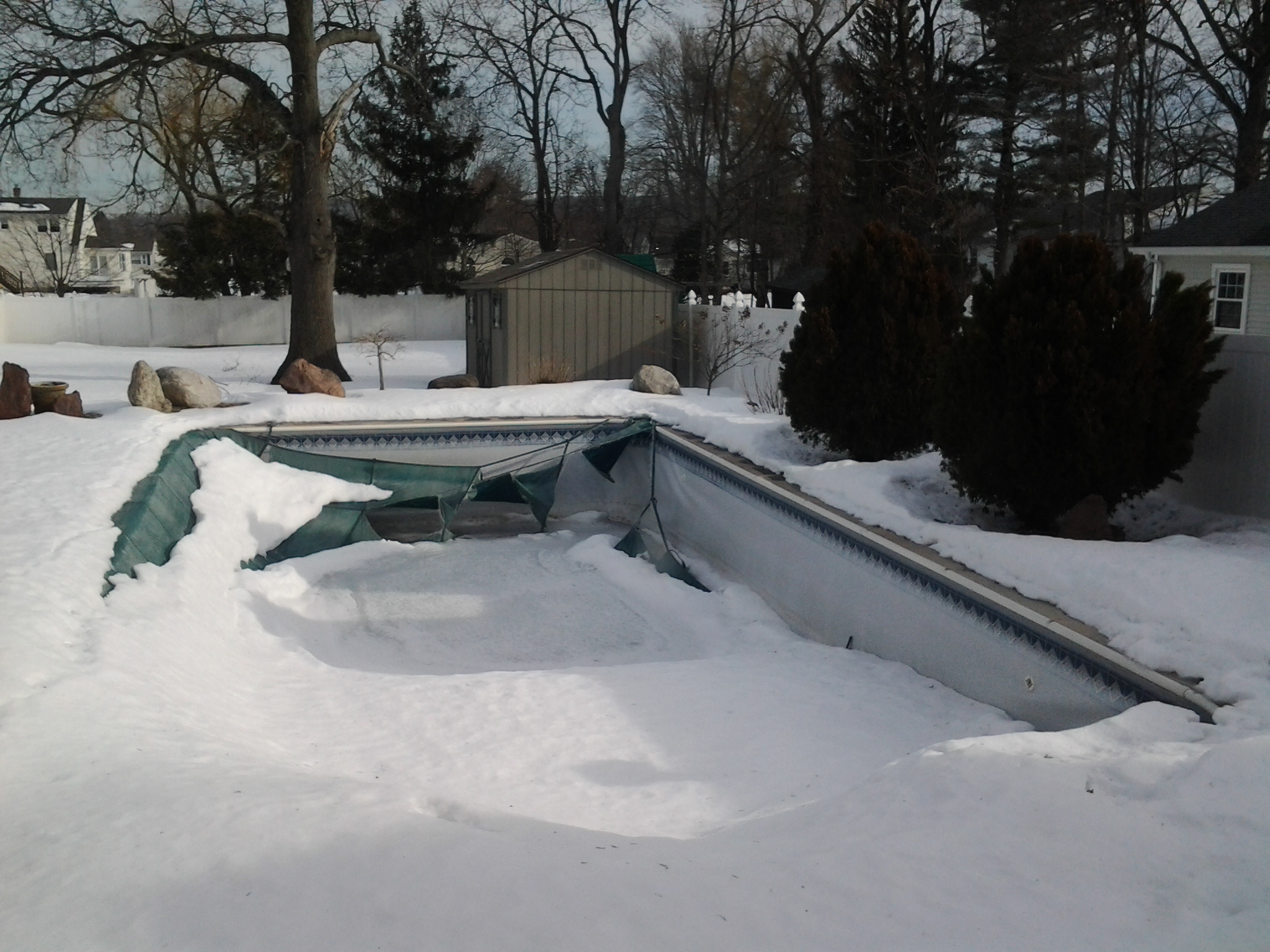 Winter Maintenance for Inground Pool Covers - The Swimming Pool Store
